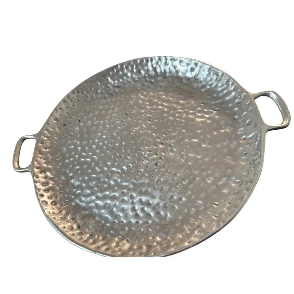 Hammered Aluminum Serving Tray from Mexico .Twelve inches diameter.